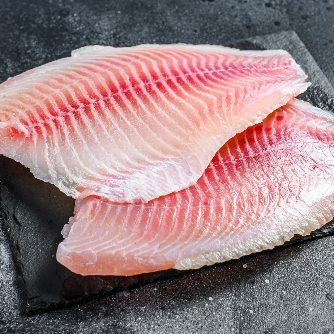 Tilapia, 20.1 g de proteína por 100 g,